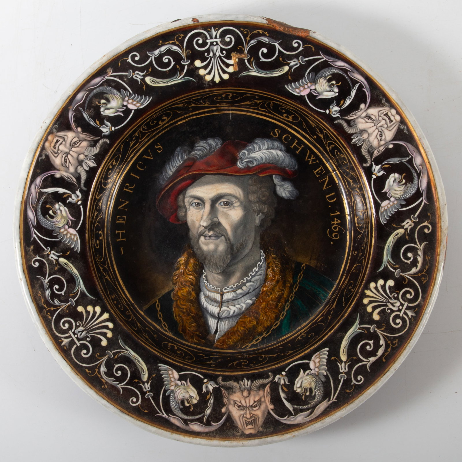 ANTIQUE LIMOGES ENAMELED PLATE: Inscribed Henricus Schwend 1469; enamel on copper; French; possibly 19th Century; some chips on rim; Dia.-12", F-G