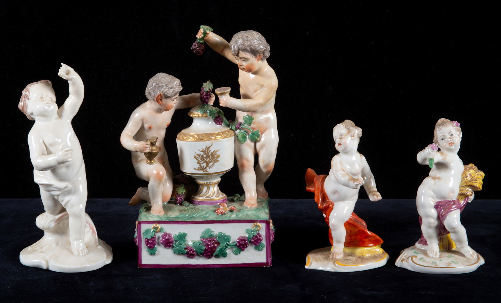 CLASSICAL PORCELAIN CHERUBS (4): Hand painted; (1) Meissen (?) group; (3) individual German (?) figures; minor losses; H-3"-6"+/-, G