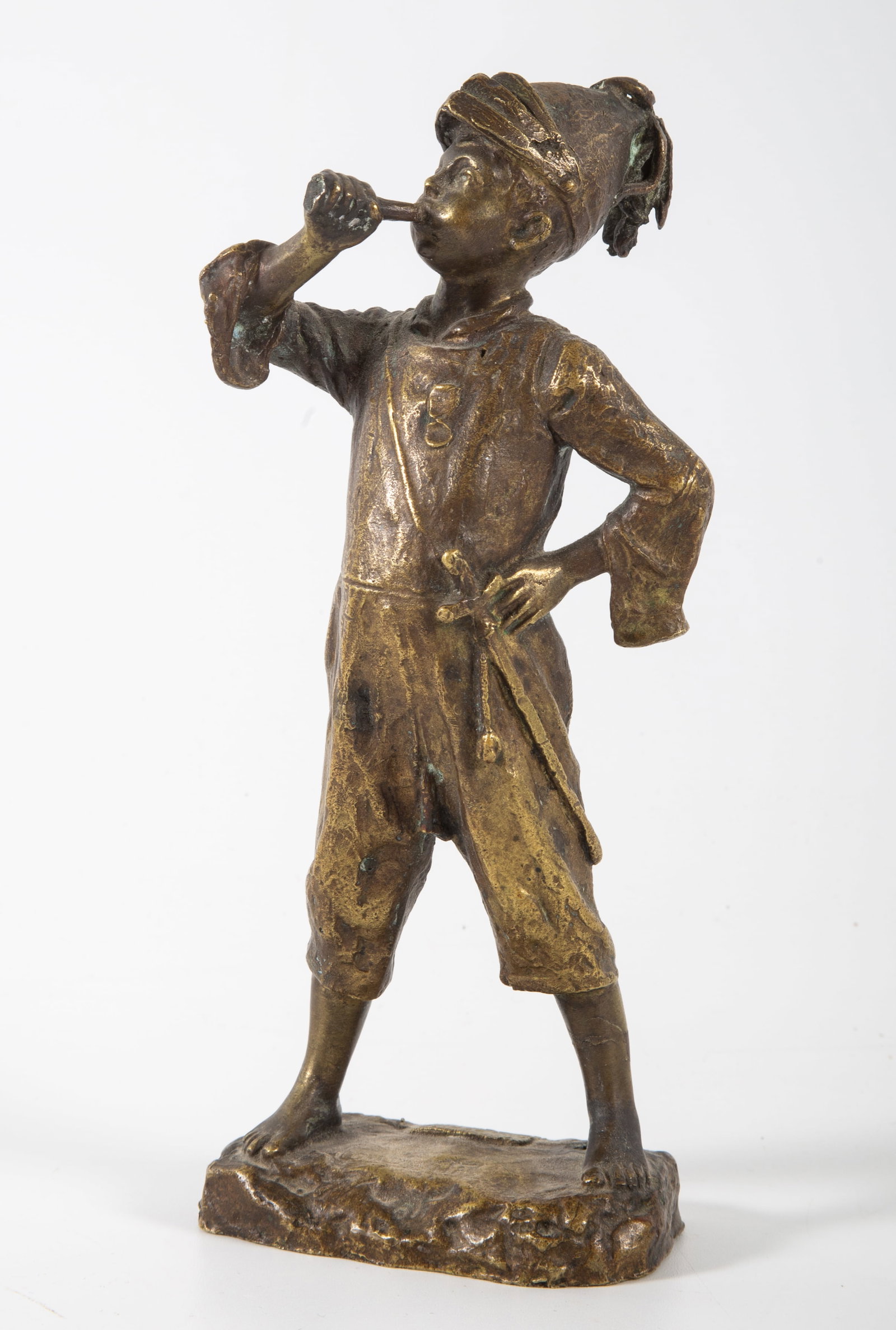 SMALL ITALIAN BRONZE OF TRUMPETER: Copyrighted (dritti d'autore); normal signs of handling; H-7", EX