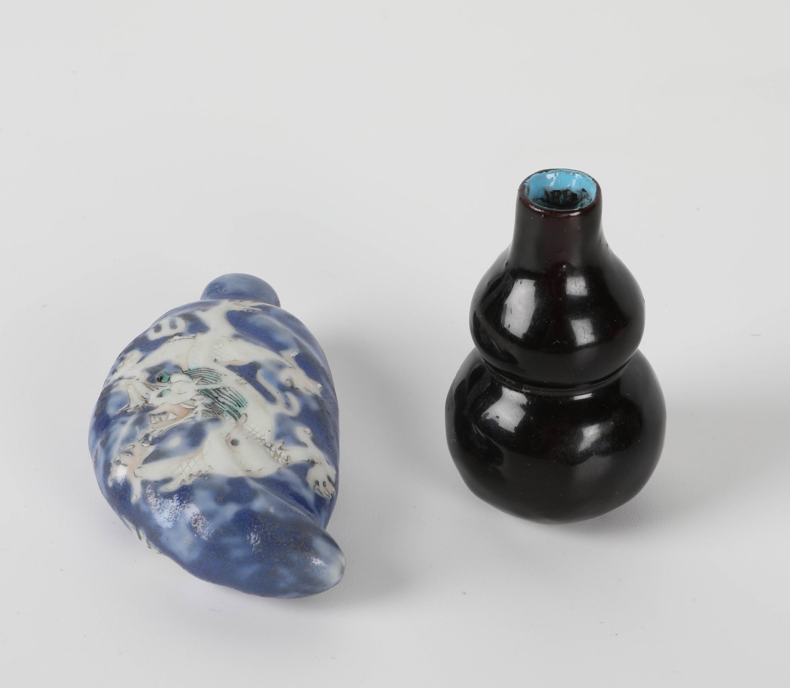 CHINESE SNUFF BOTTLE & GOURD VASE: (1) snuff bottle: blue and white raised with dragons, H-2 1/2"; (1) miniature vase, H-2 1/4", VG