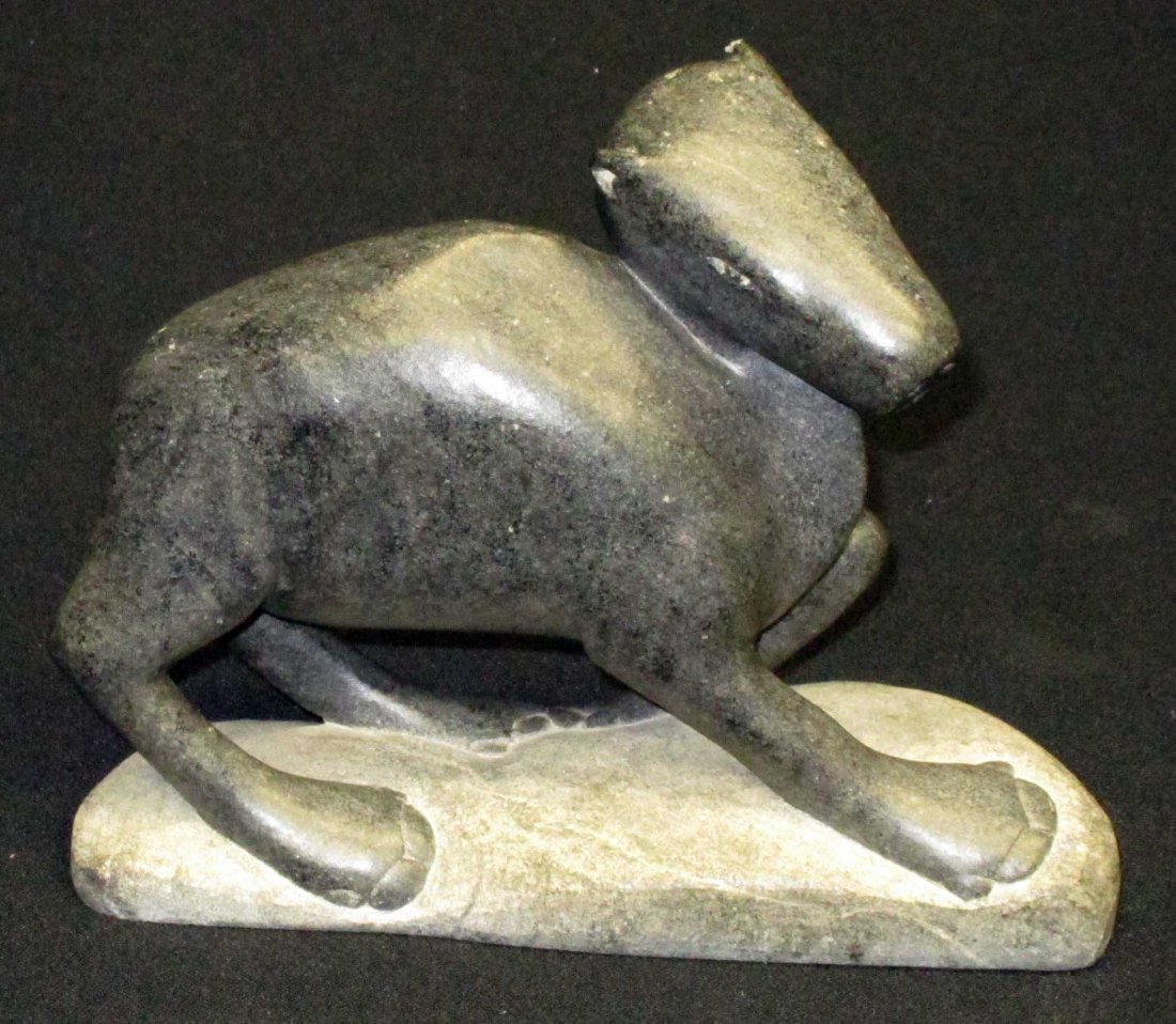 STONE CARIBOU, WALRUS & STYLIZED ANIMALS: (1) Inuit caribou sculpture Qoomalux Poy Dae 1982, H-7", L-8"; (1) stylized animal sculpture on slate base, initialled S. S., H-6 1/2", L-8"; (1) Stone stylized walrus sculpture; VG-EX