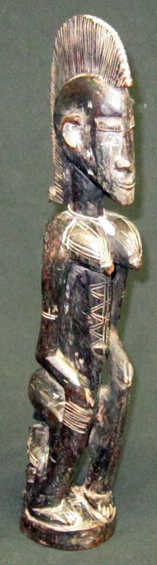 AFRICAN TRIBAL SCULPTURES (3): (1) African female sculpture: carved wood; H-19", L-4"; (1) Dogon Mali Burking Fasso figure: carved wood, H-22", L-2 1/2"; (1) Sepik River food hook: male figure, H-19", L-4"