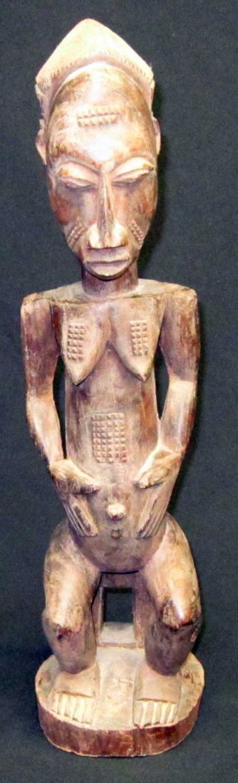 AFRICAN TRIBAL SCULPTURES (3): (1) Baule (Ivory Coast): carved wood, H-21", L-5"; (1) Baule (Ivory Coast) female figure: carved wood, H-24", L-4"; (1) Samafo (Cote di Ivory - Mali): carved wood, H-26", L-5 1/2"