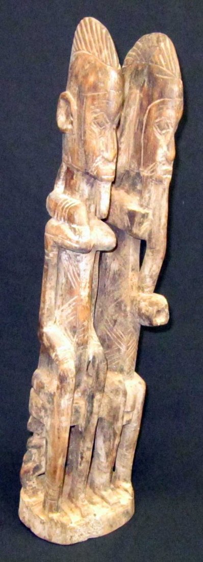 AFRICAN TRIBAL SCULPTURES (3): (1) Sculpture: Dogon Cliff-dwelling people Mali Burkiha Fasso, carved wooden sculpture, H-22 1/2", L-5"; (1) tribal sculpture: carved wood with cloth, H-26", L-5"; (1) tribal sculpture: carved wood, H