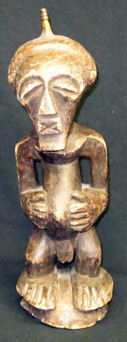 AFRICAN TRIBAL SCULPTURES (4): (1) Senufo Power Figure: Cote d'Ivorie, carved wood, H-22", L-6"; (1) Senufo Mouse Catcher: Mali, carved wood, H-20", L-5 1/2"; (1) Songye sculpture: carved wood, H-20", L-7"; (1) possibly Luba figure