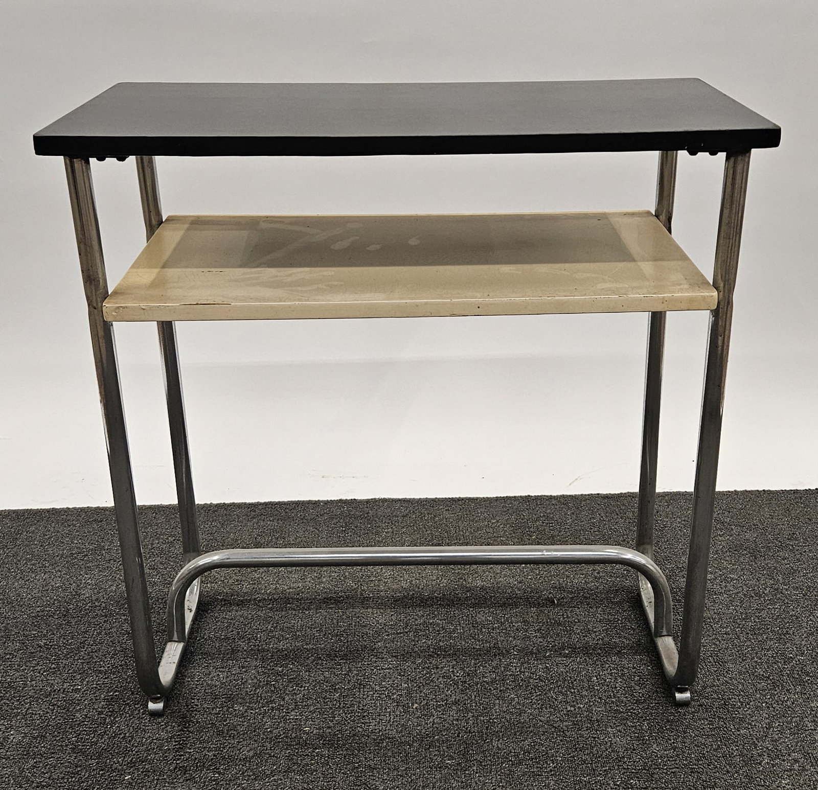 DECO-STYLE TABLE: Lacquered wood tiered table with tubular chromed supports; 30"x30"; some chips and crazing; normal wear, F-G