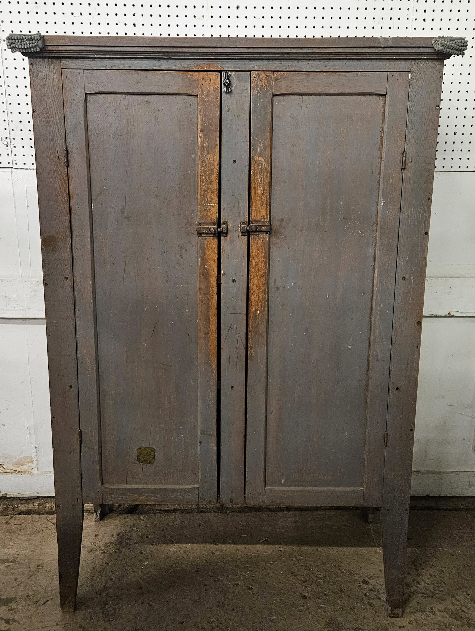 COUNTRY CUPBOARD: Painted oak and mixed wood (2) door cupboard; tall legs; H-60"xW-40"; paint wear and split in top, F-G