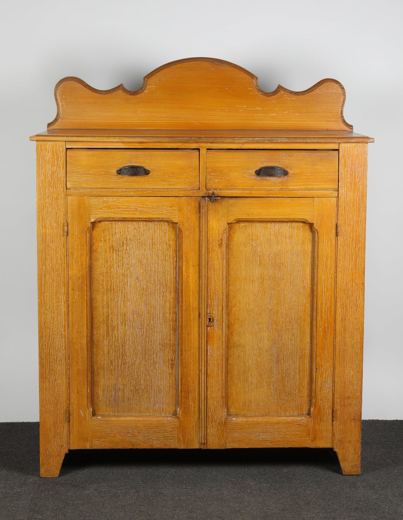 COUNTRY JELLY CUPBOARD: Grain painted pine and mixed wood; (2) drawers over (2) paneled doors; solid ends; H-57 1/2"xW-45 1/2"xD-18 1/4"; streaky paint loss; wear, G-G+