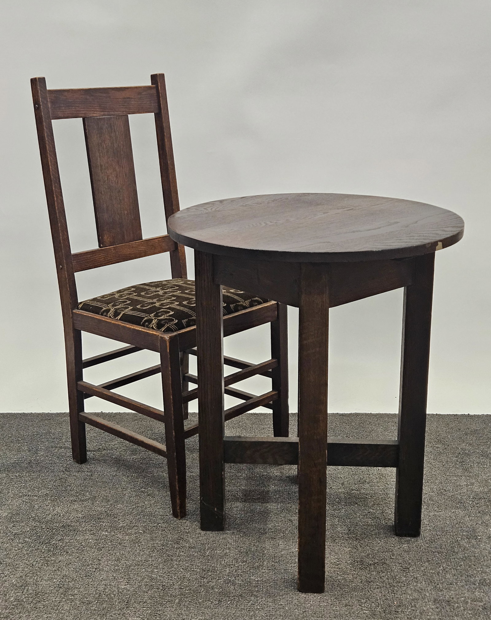 MISSION TABLE AND CHAIR: Oak - (1) 24" diameter round lamp table, H-29"; (1) 40"Hx16"W splat back side chair; original finish, G-VG