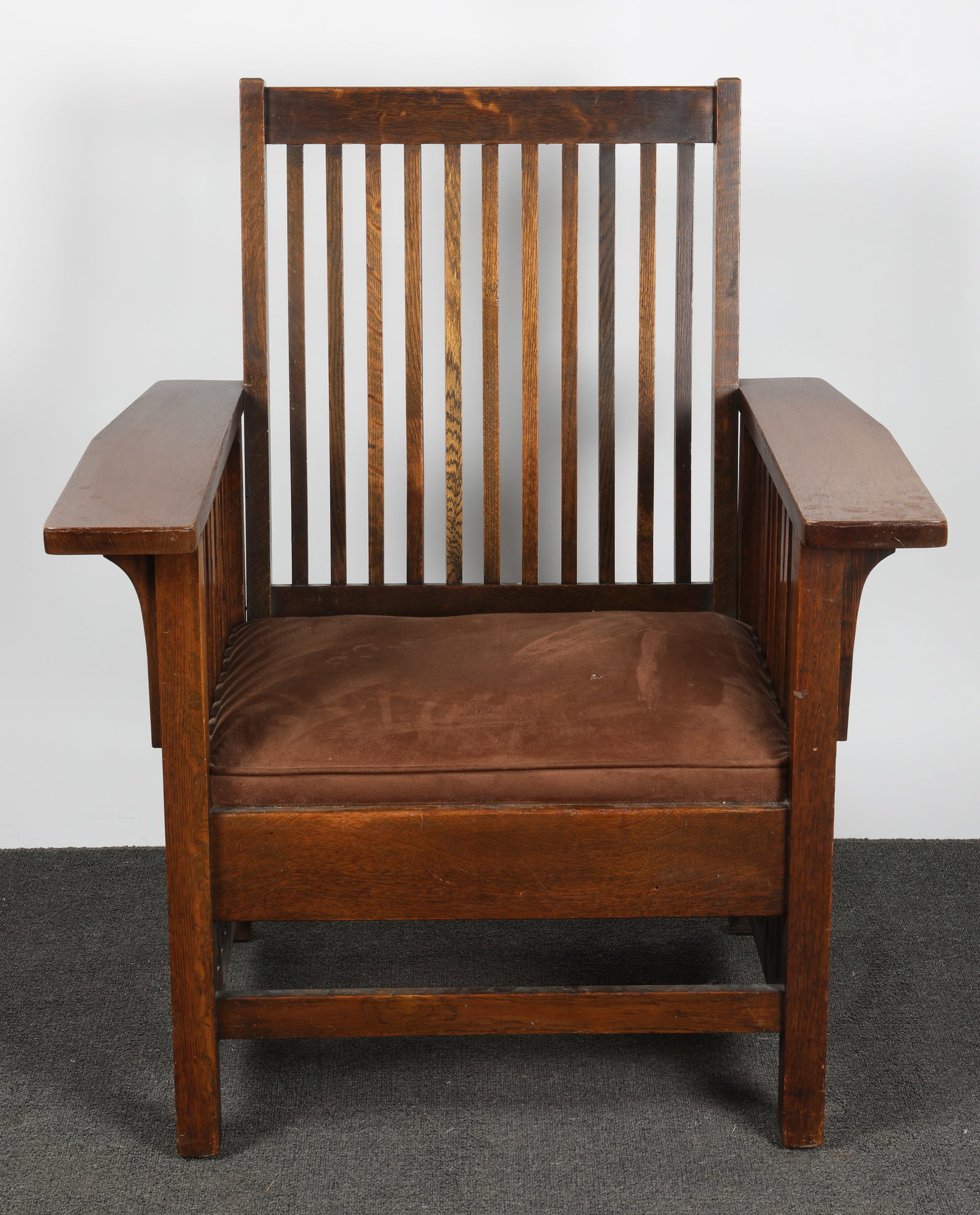 MISSION ARM CHAIR: Oak - (11) spindle back; original finish; H-38 1/2"xW-32"; normal wear, G-G+