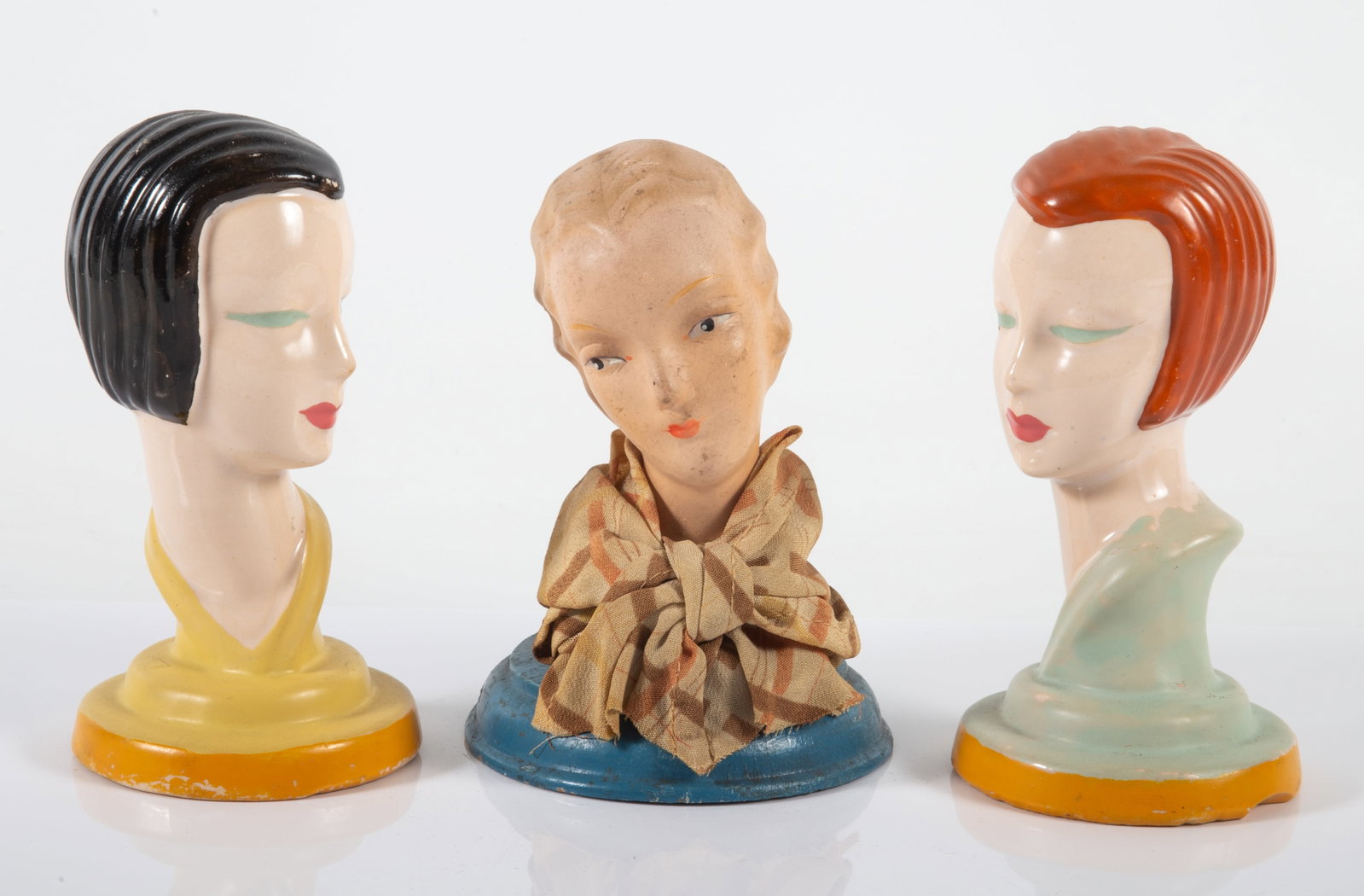 (3) DECO LADY HEAD FIGURINES: (1) stamped on bottom "By Mlonel"; tallest 5 1/2"; some chips and paint wear, F-G