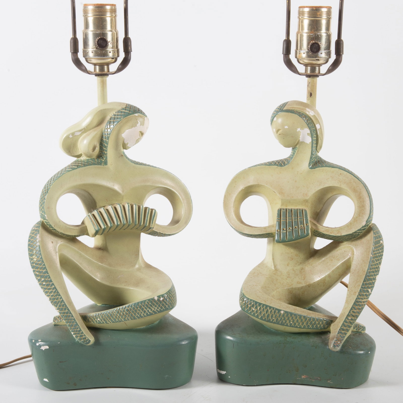 (2) MID CENTURY MODERN FIGURAL LAMPS: Painted ceramic; marked: F.A.L.P.; H-22"; chips in paint; normal wear, F-G