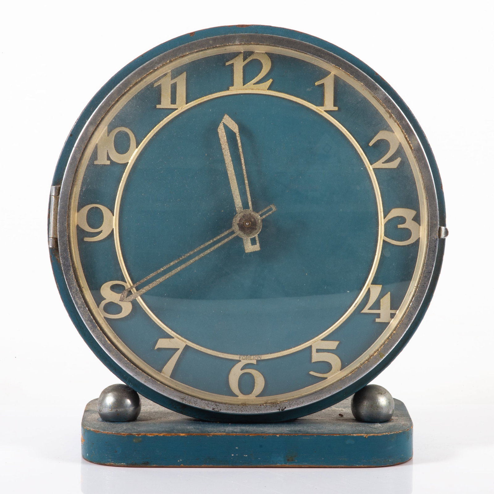 ART DECO TABLE CLOCK: Blue painted wood with chrome; mechanical wind-up movement; working; H-7 1/2"xW-7"; some paint wear, F-G