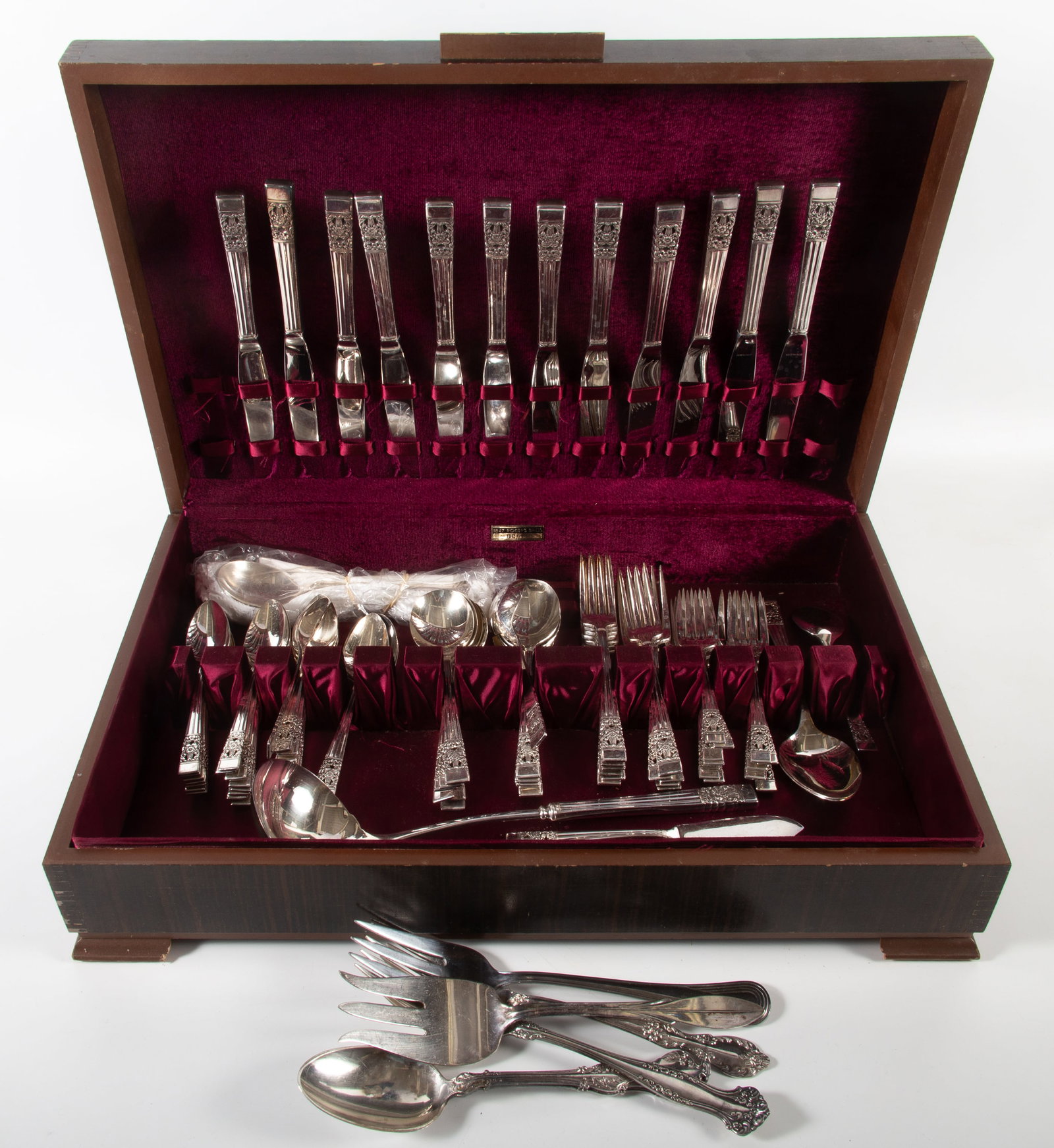 COMMUNITY PLATED FLATWARE: Deco pattern: (12) knives, (24) teaspoons, (12) soup spoons, (12) forks, (12) salad forks, (2) large serving spoons, (1) punch ladle, (5) assorted small service pieces - together with (6) non-matching