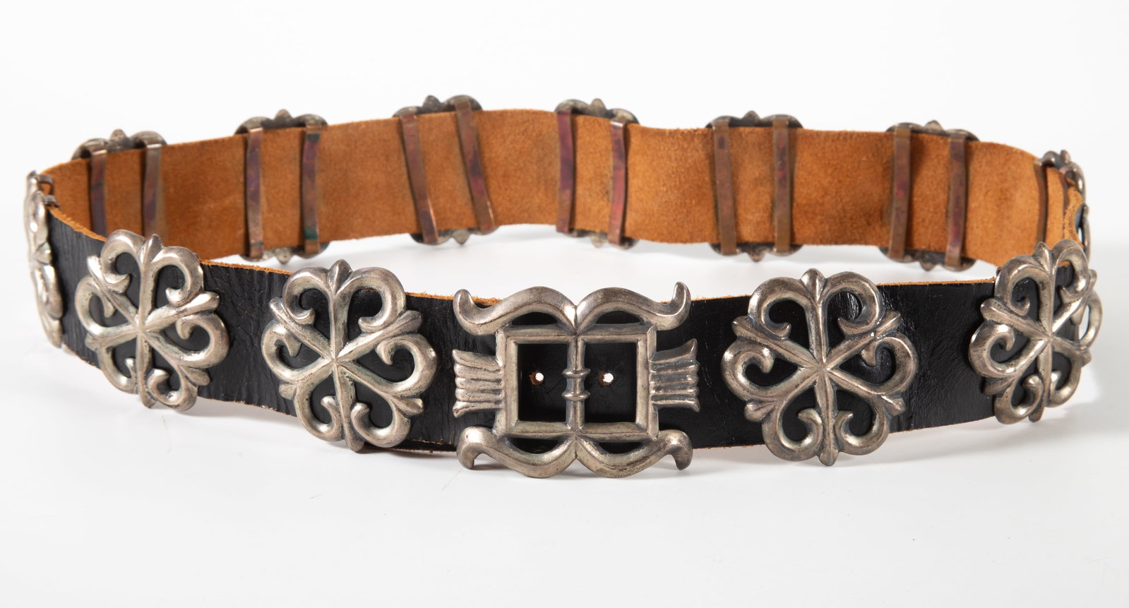 SOUTHWEST CONCHO BELT: Leather with (12) reticulated slides and buckle; 35"; 16.37 T.O., VG-EX