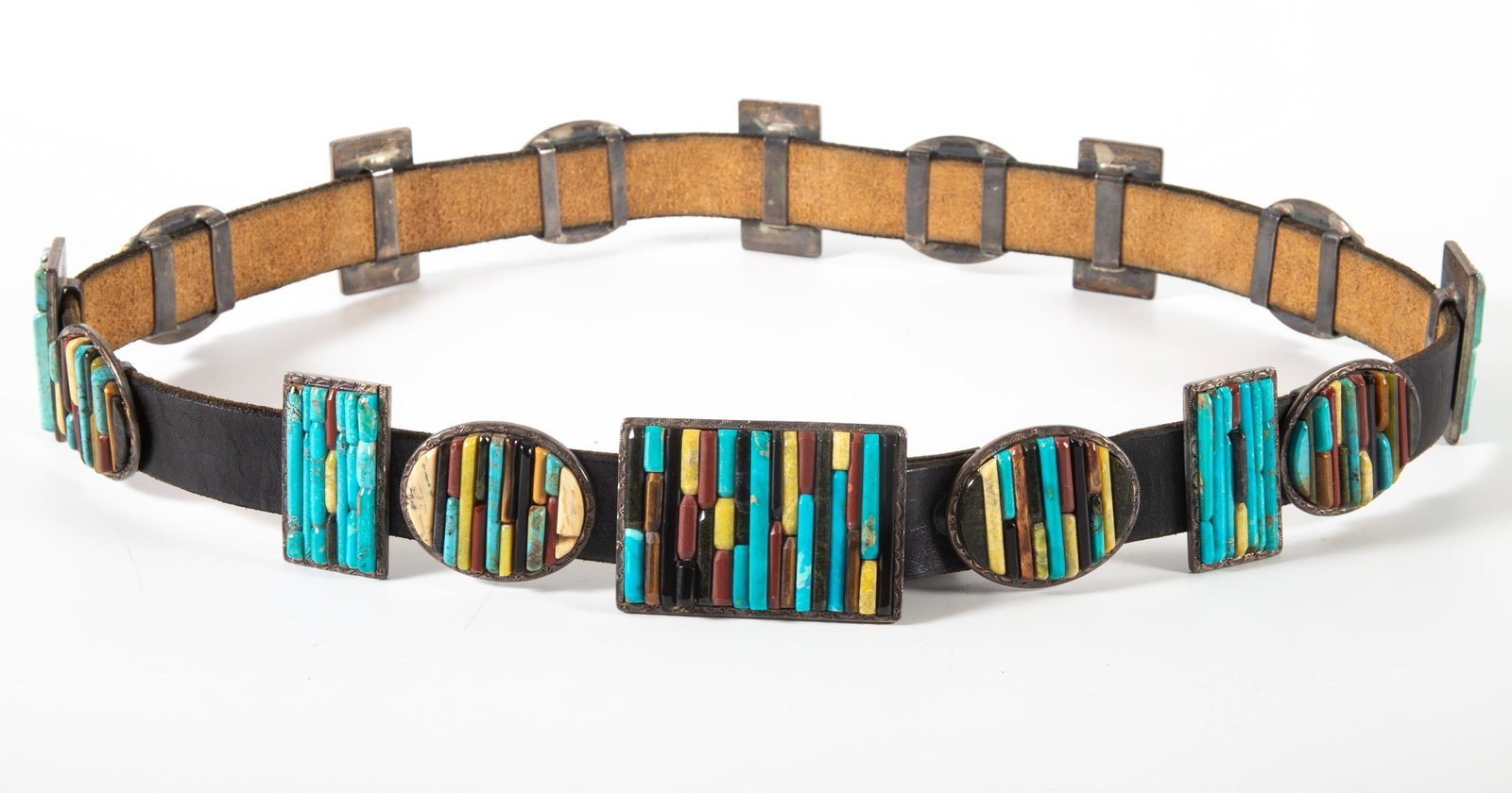 SOUTHWEST CONCHO BELT: Leather belt with alternating oval and rectangular silver bezeled cobblestone slides and buckle; L-38 5/8", VG-EX