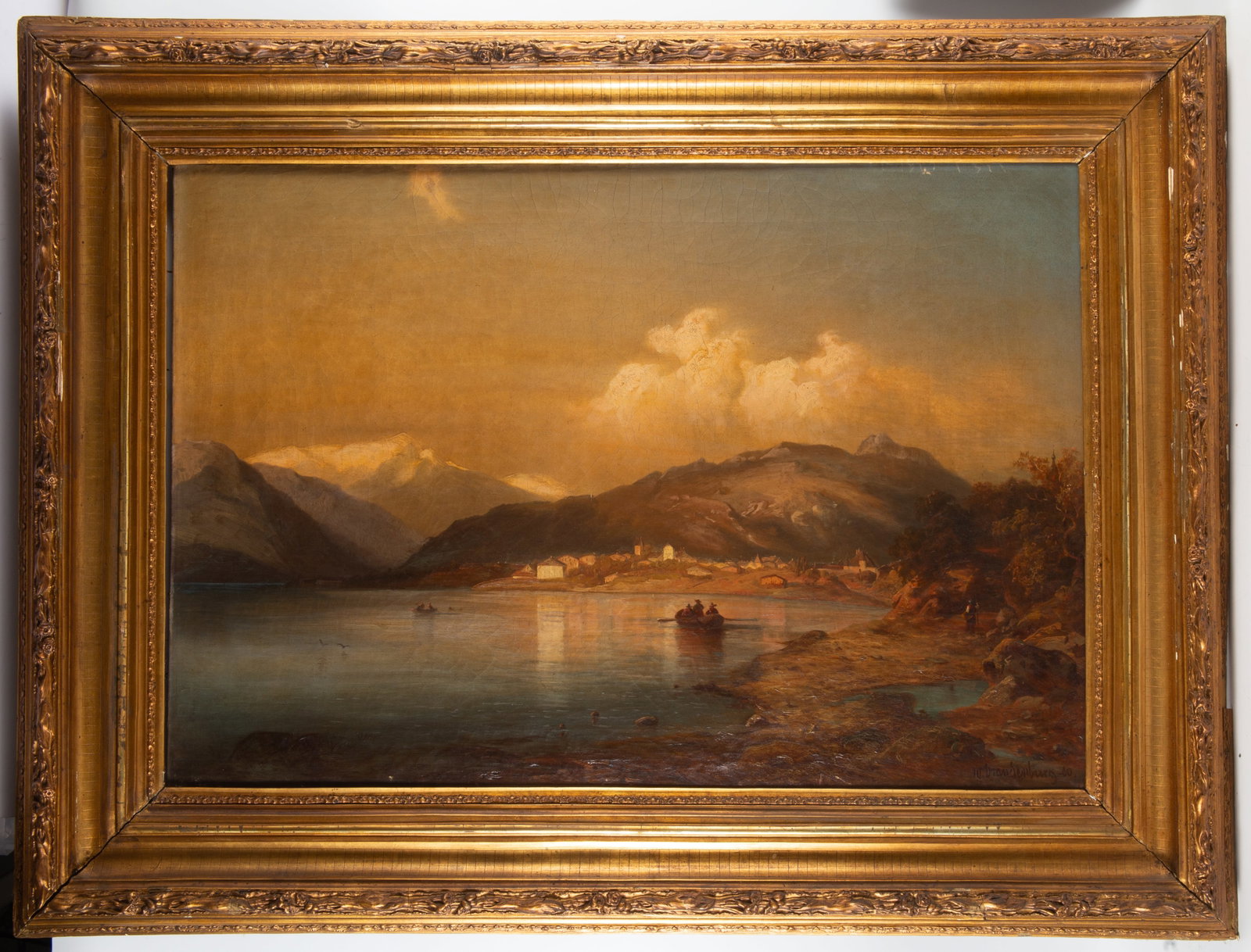 BRANDENBURG LANDSCAPE PAINTING: Oil on canvas; signed lower right "Brandenburg - 1860"; large lake scene with village, mountains, boats, etc.; image 22"x32" - gilt frame 32"x42"; uniform light crazing, needs cleaning, G-G+
