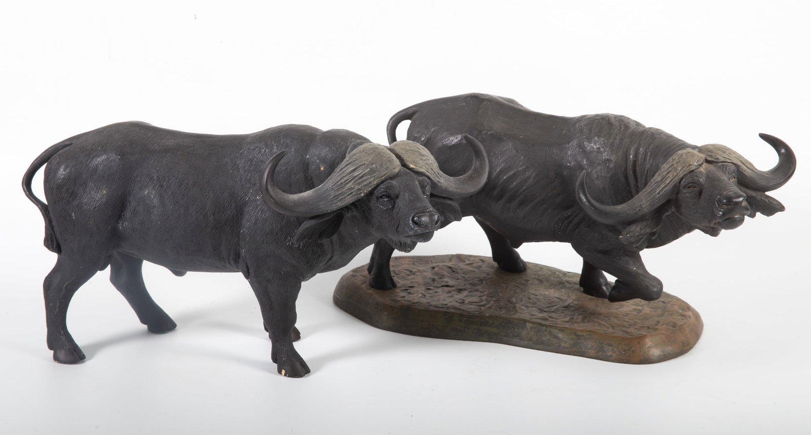 (2) ROWLAND WARD WATER BUFFALOES: Painted composition - (1) buffalo bull on base - 181/200 - Jackie Noakes; (1) buffalo - 194/400; L-14"; normal wear, VG-EX
