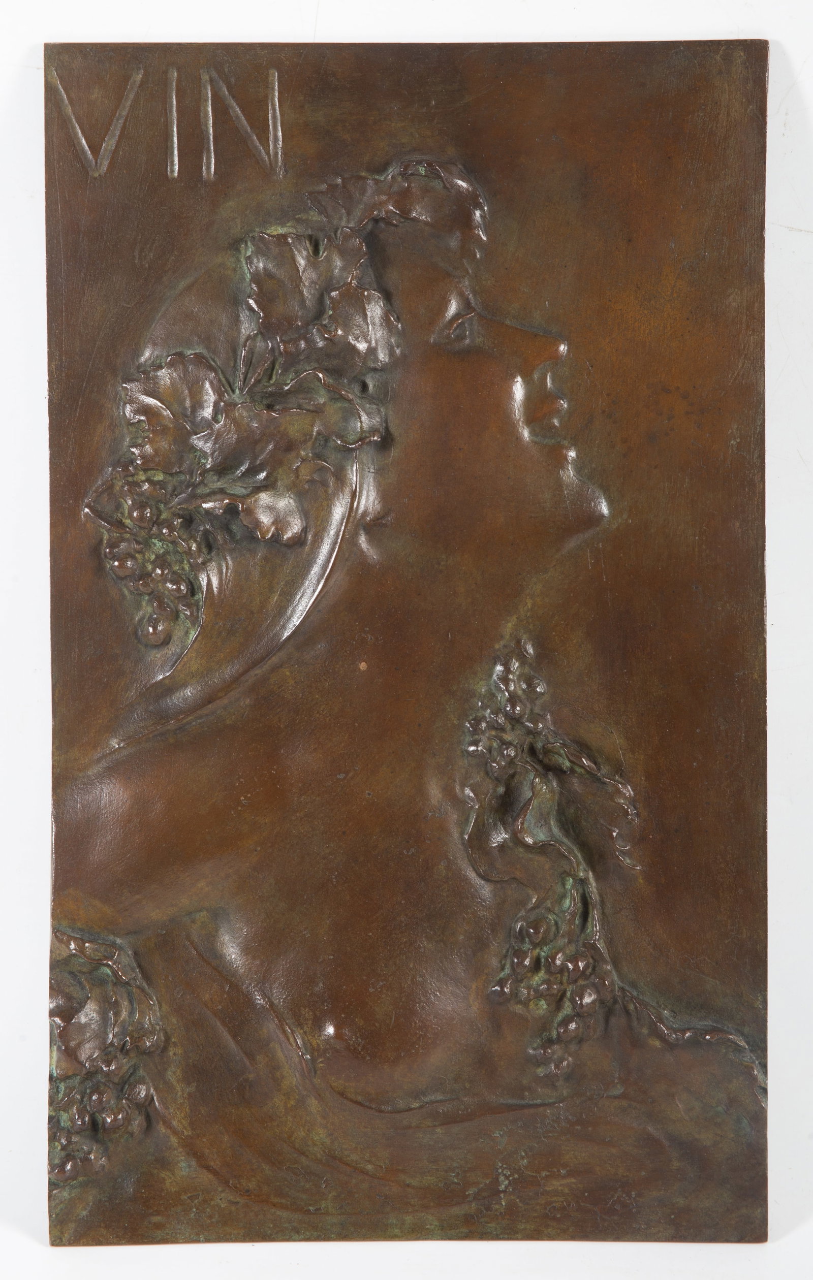 BRONZE ART NOUVEAU PLAQUE: "Vin" - relief cast plaque of woman with grape crown and sprays in flowing hair; 16"x9 1/2"; normal wear, VG-EX