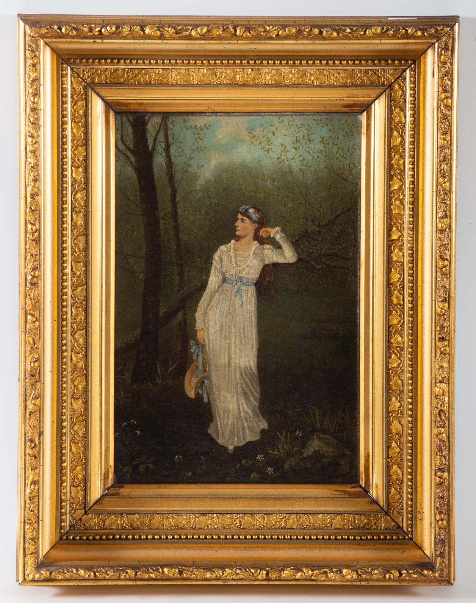 VICTORIAN PAINTING OF WOMAN: Oil on canvas, unsigned - woman with flowing hair standing in forest with bonnet in hand, image 11"x8" - frame 17"x13", normal wear, G-VG