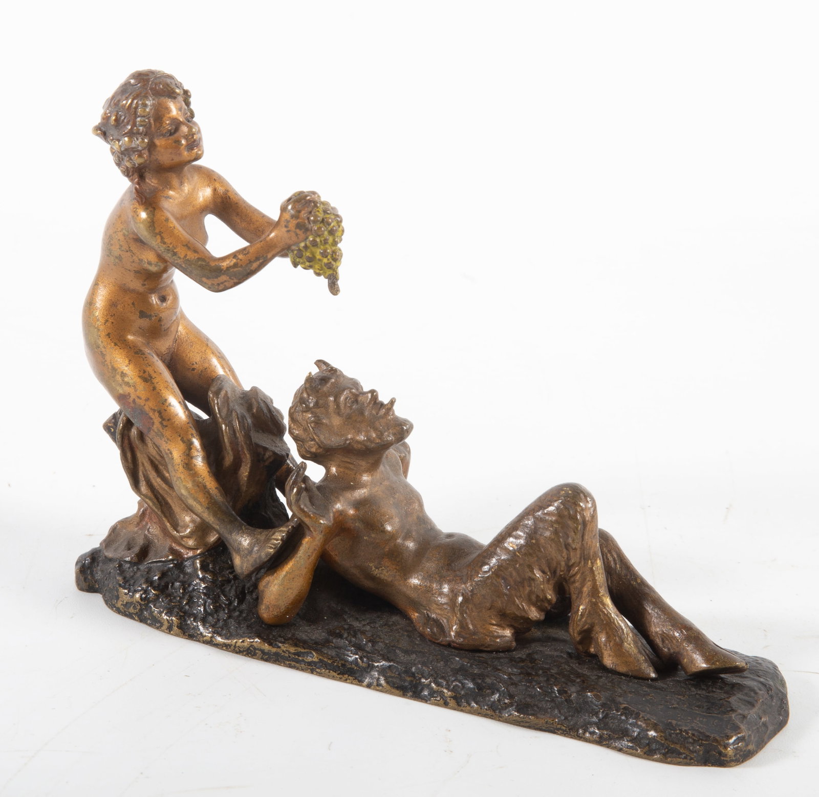 EROTIC AUSTRIAN BRONZE: (2) piece bronze group with nude feeding satyr grapes, the erotic pose reverses the nude, signed N. (?), 3"x4 1/2", wear, G-VG