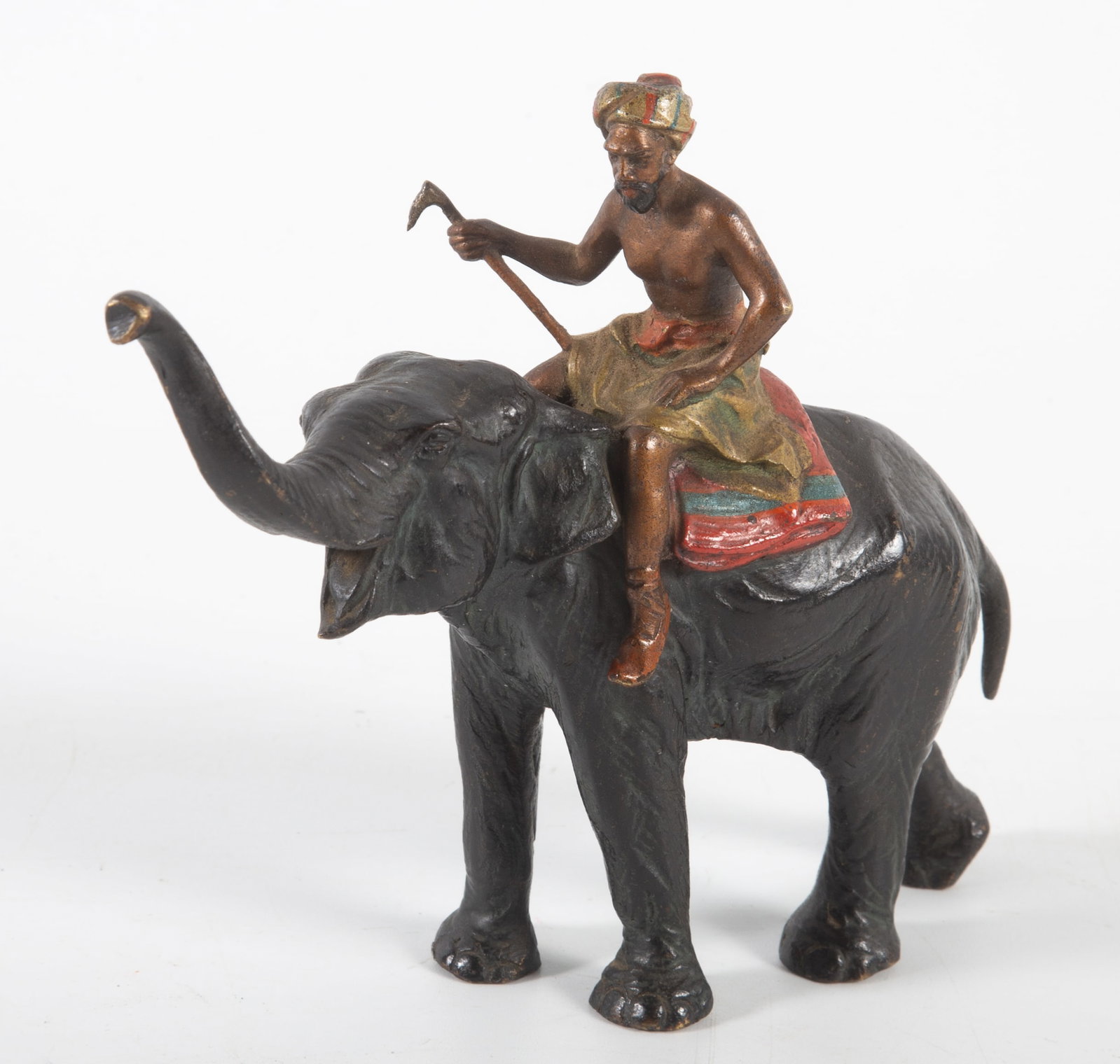 SMALL AUSTRIAN BRONZE ELEPHANT/FIGURE: Contemporary, figure with cane riding elephant, unsigned, H-4 1/2"xL-5", normal wear, VG-EX