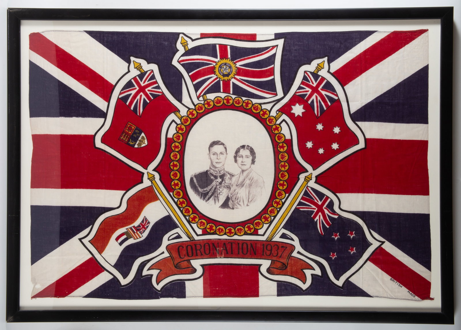 1937 CORONATION FLAG: Printed on cloth, image 23"x34" - frame 27"x38", normal wear, G-VG