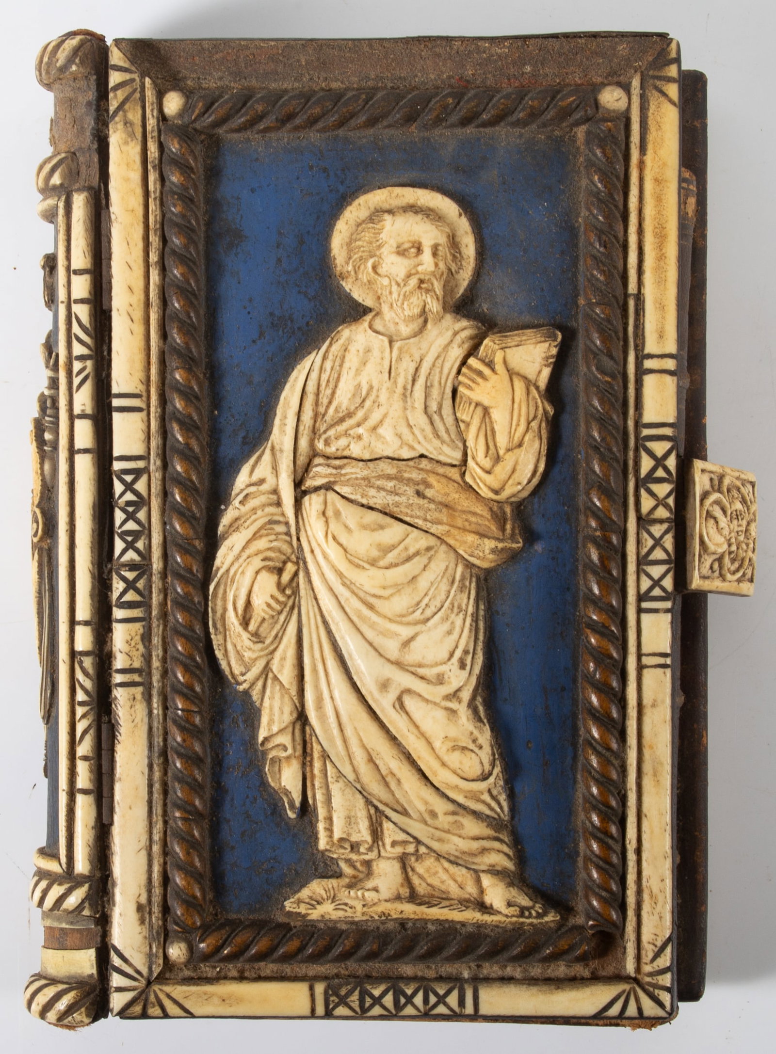 ANTIQUE CARVED BONE BIBLE COVER: Relief carvings of saints; some losses; H-10", F-G