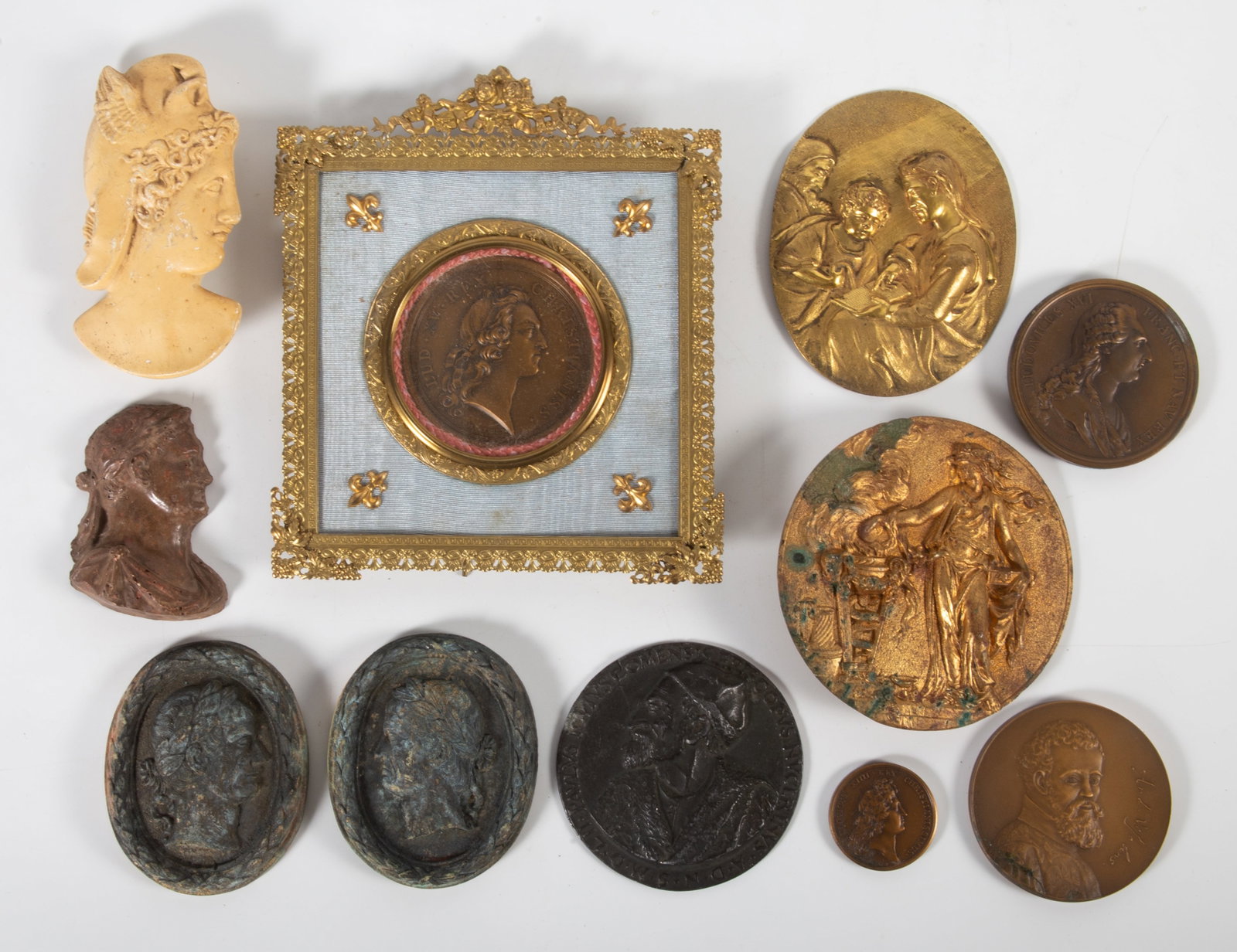 GROUP (9) PORTRAIT MEDALLIONS: Bronze and composition; largest 7 1/2", G