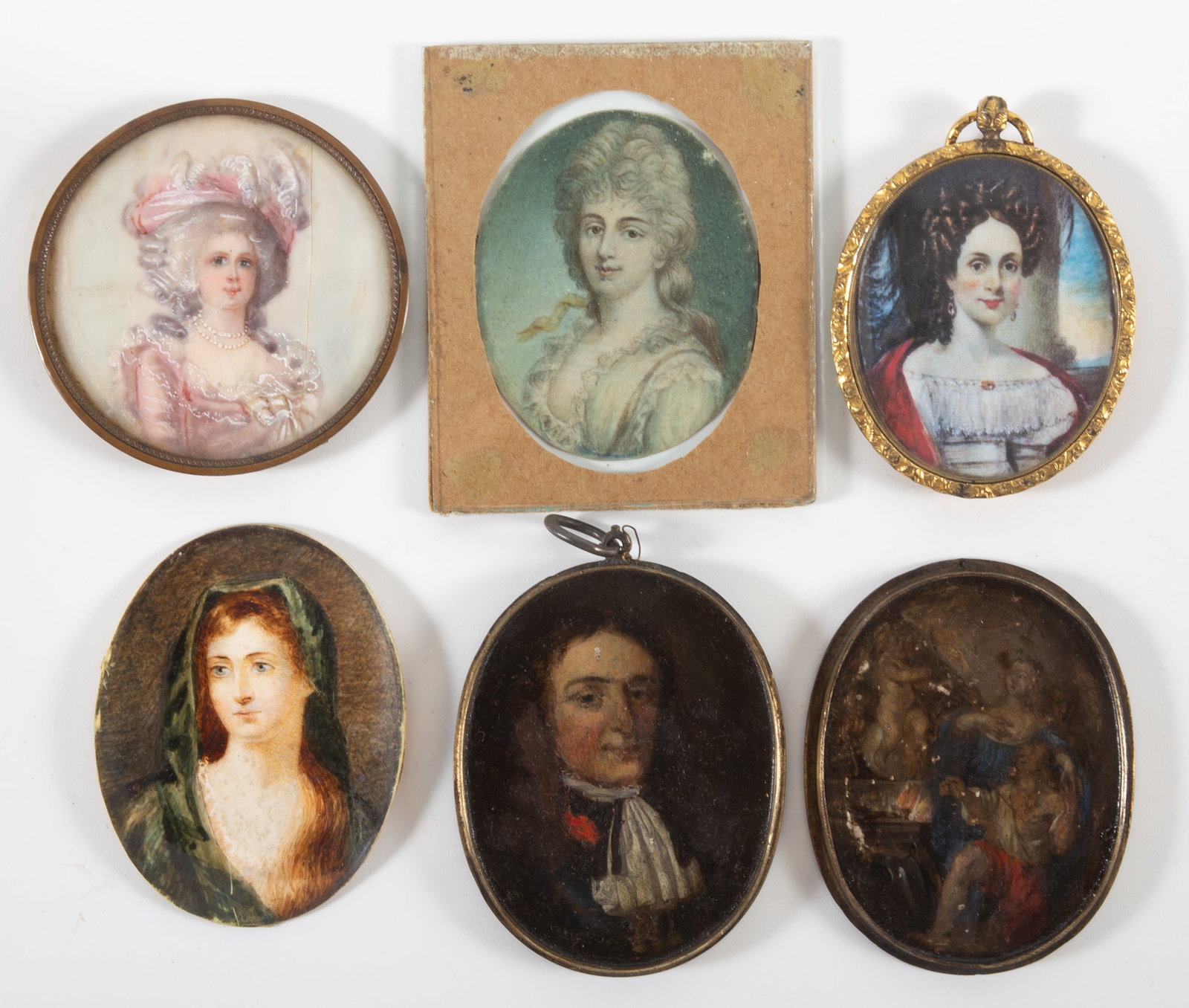 (5) PORTRAIT MINIATURES: Painted on various materials - (3) women painted, (1) transfer print, (1) gentleman painted on brass in a closed case; H-2 1/2"xL-3"; normal wear, F-G