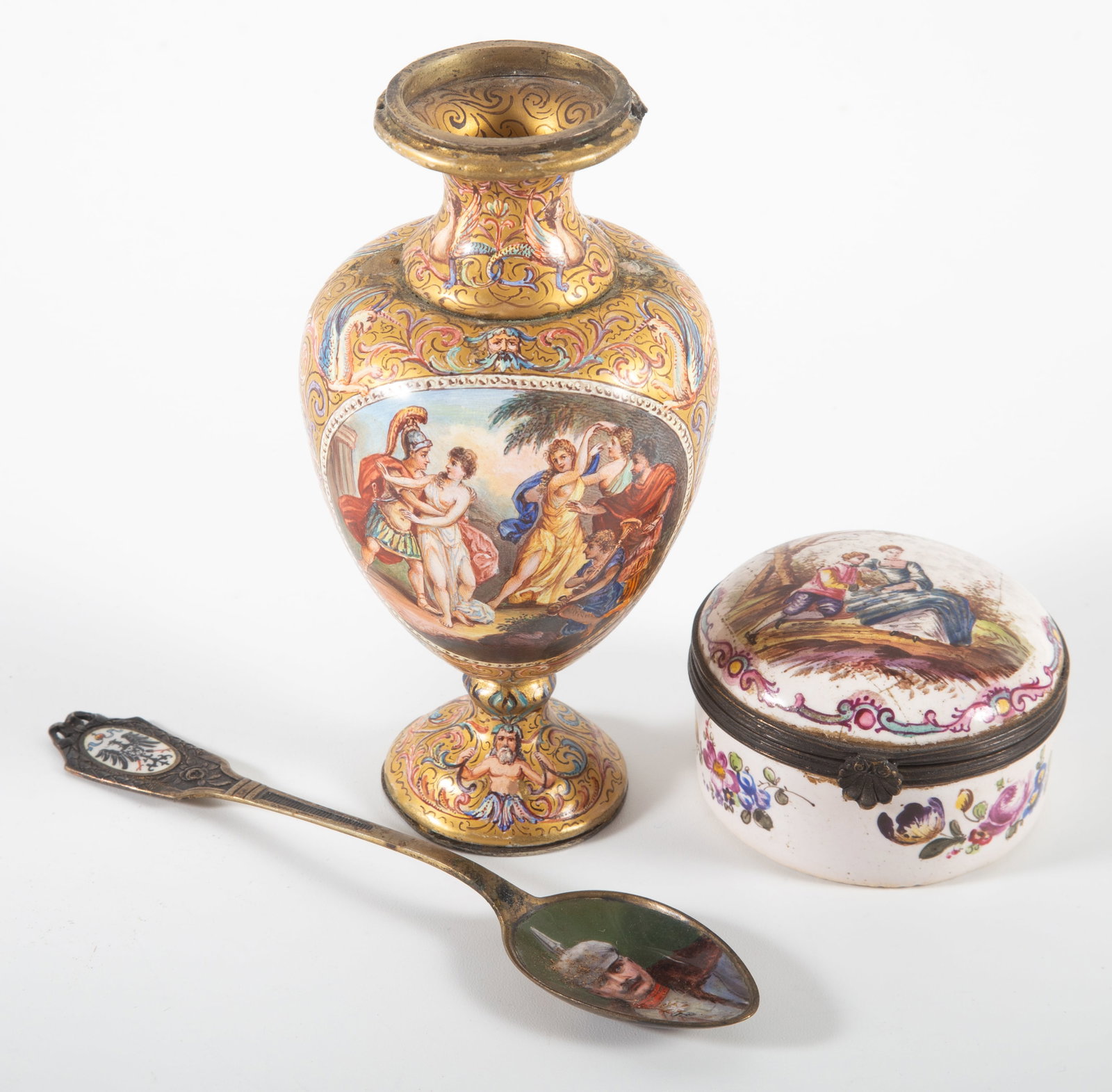 (3) OBJET D'ART: (1) 5" miniature vase - classical scene over brass, some small losses, may have had a lid; (1) 2" diameter Battersea round box, top cracked; (1) 5" bronze Russian spoon; wear, F-G