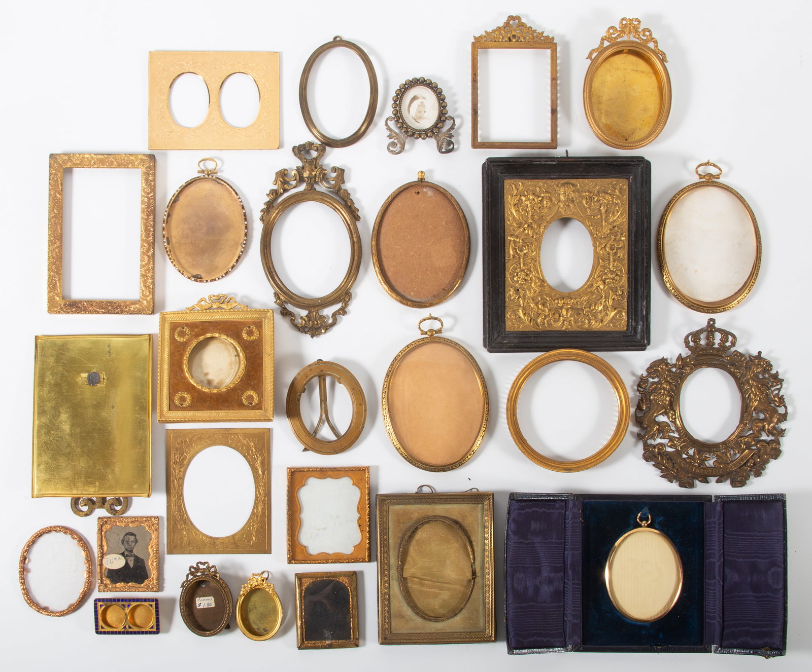 (27+/-) MINIATURE FRAMES: Brass, enamel, tin, etc.; some complete, some parts, wear, H 2"-6.5", F-VG