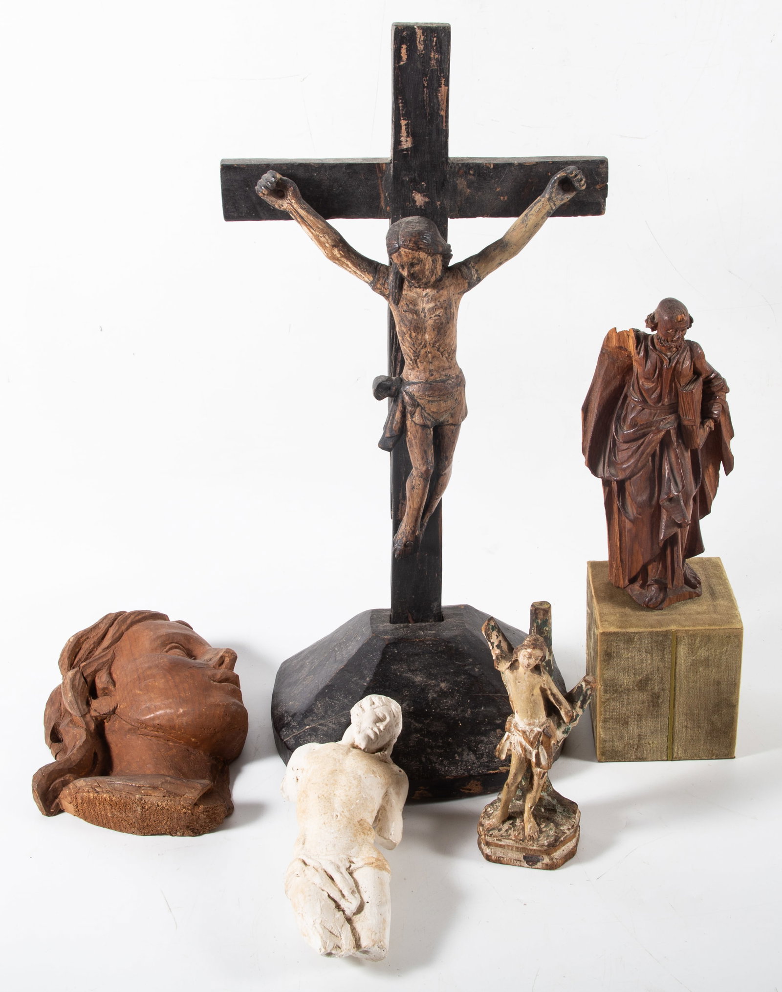 (5) RELIGIOUS CARVINGS, ETC.: (4) Carved wood, all with losses; (1) plaster cast with loss; H 7"-17", P-F