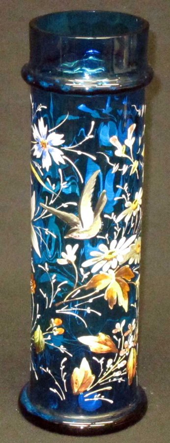 BLUE GLASS & ENAMELED STRAW HOLDER: Blue glass with interior thumbprint pattern; elaborately enameled with bird, butterfly, and floral decoration; collared top; L-11", VG-EX