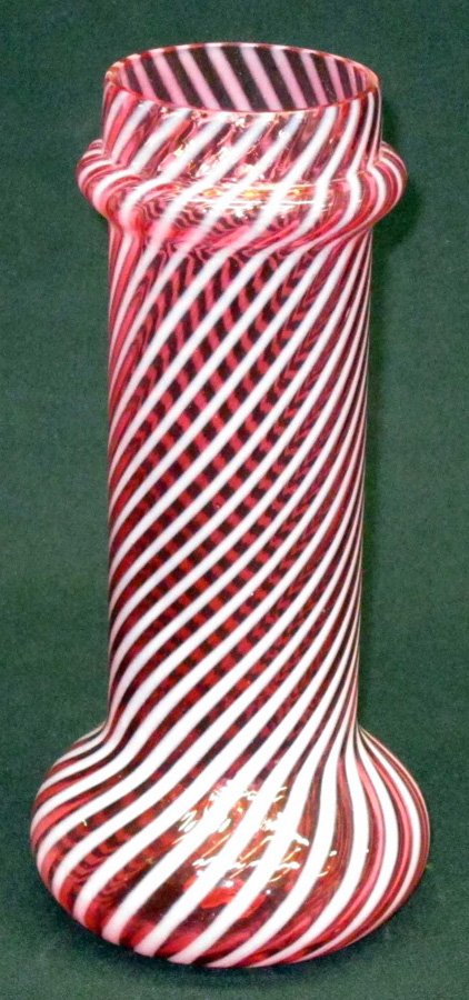 CRANBERRY OPALESCENT GLASS STRAW HOLDER: White opalescent swirl; collared top; bulbous base; minor rim flakes; collar top has firing flaw; H-9 1/2", VG-EX