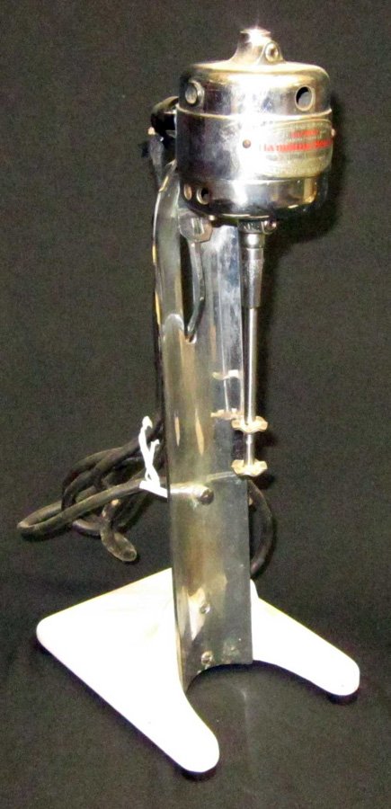 GILCHRIST MILK SHAKE MIXER #32: Manufactured by Hamilton Beach; white porcelain base; unusual latch mechanism; runs; comes with cup (not shown); cord frayed; H-17", VG-EX