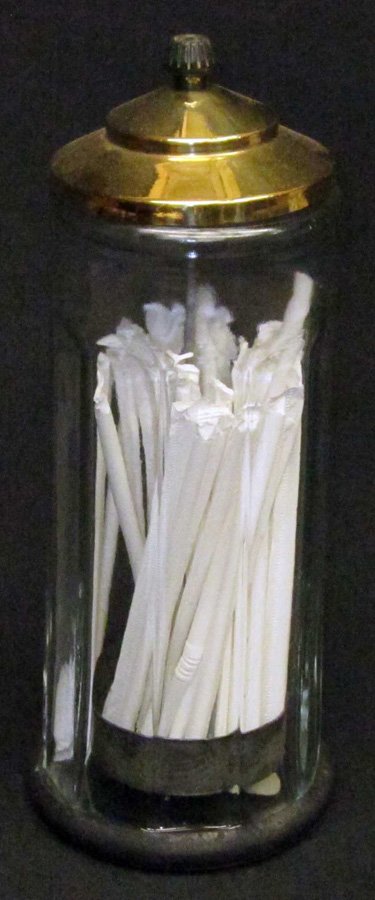 CLEAR GLASS STRAW HOLDER: Arched vertical panels; metal top with lifter; unusual applied rubber base; H-11", VG-EX