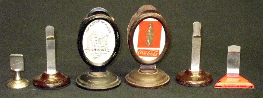 ICE CREAM ADVERTISING MENU HOLDERS (6): Metal or celluloid bases; (2) have inserts: Gallanis, Coca-Cola; (4) are bases only: Jersey, Gold Nugget, Hydrox, Horlicks; Coca-Cola is probably assembled; tallest H-5", F-G