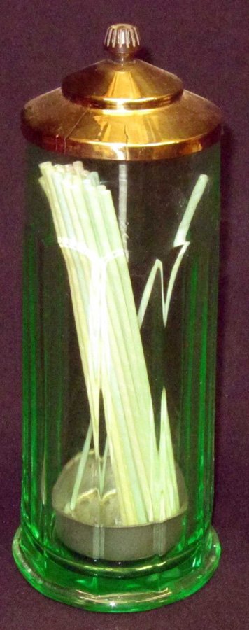 GREEN DEPRESSION GLASS STRAW HOLDER: Arched vertical panels; brass top; has crack and replaced knob; interior lifter; H-11", VG