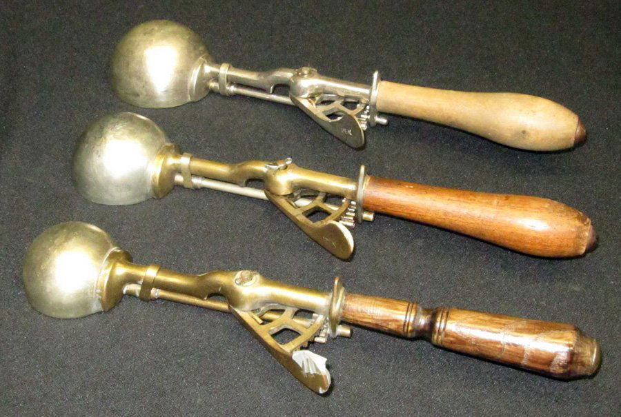 IDEAL ICE CREAM SCOOPS (3): Wooden handles, (1) [16], L-11"; (1) [20], L-10"; (1) [24], L-10"; original finish, G