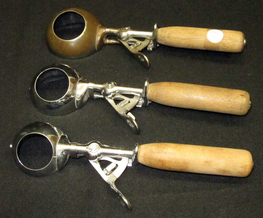 HAMILTON BEACH NO-PAK 31 ICE CREAM SCOOPS (3): Wooden handles; (1) [6], L-10"; (1) [12], L-9 1/2"; (1) [20], L-9"; original finish; G