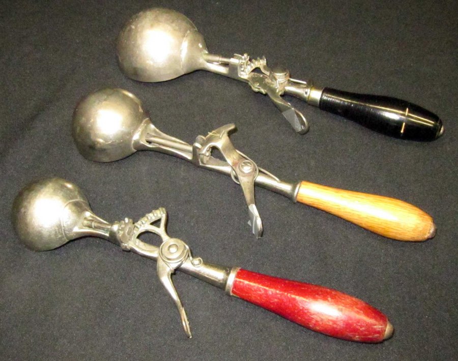 ASSORTED WOODEN HANDLE ICE CREAM SCOOPS (3): (1) Clipper F. S. Co. No. 4 [6], L-11 1/2" (1) unmarked "Square Deal" [16], L-11"; (1) Nu Gem [20], L-10"; original finish; G-VG