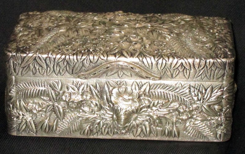 KIRK & SON STERLING REPOUSSE BOX: 11oz.; monogrammed on bottom, floral and foliate motif with hand chasing; 14.54 TO. L-6 1/2", G-VG
