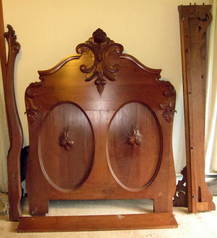 VICTORIAN BED: Walnut, (2) oval panels with carved fruit, carved crest; needs repair, refinishing and assembly; H-83", L-56", F-G