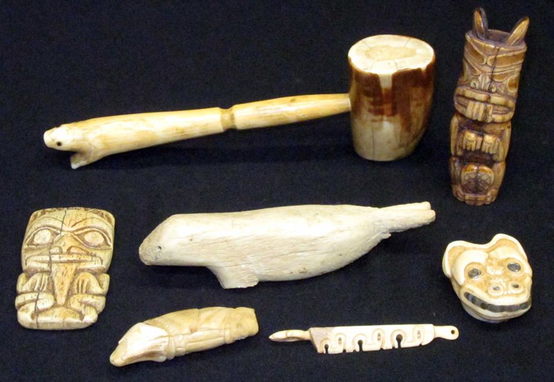 ESKIMO & NORTHWEST BONE / IVORY CARVINGS (7): (1) figural gavel, totem type carvings, (1) bone seal, (2) masks; gavel L-8", G