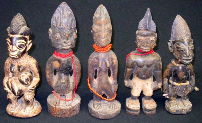 AFRICAN IBEJI CULT FIGURES (5): Yoruba tribe, Nigeria; carved wood; one figure has split at base; overall scuffs; tallest H-11", G-VG
