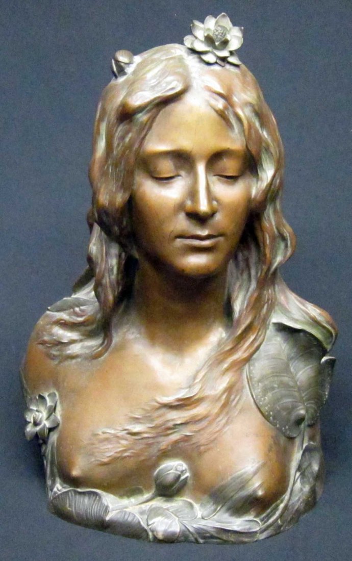 L. SAVINE ART NOUVEAU BRONZE BUST: Beautiful woman with flowing hair, flowers and lily pads; back scenic with lake scene; original finish; some scratches on face and bust; H-20 1/2", W-13", G