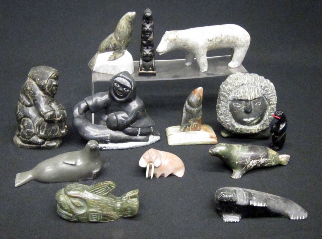 INUIT CARVINGS (12): Soapstone and various materials; several signed; some scratches and wear; bear L-6 1/2", G-VG