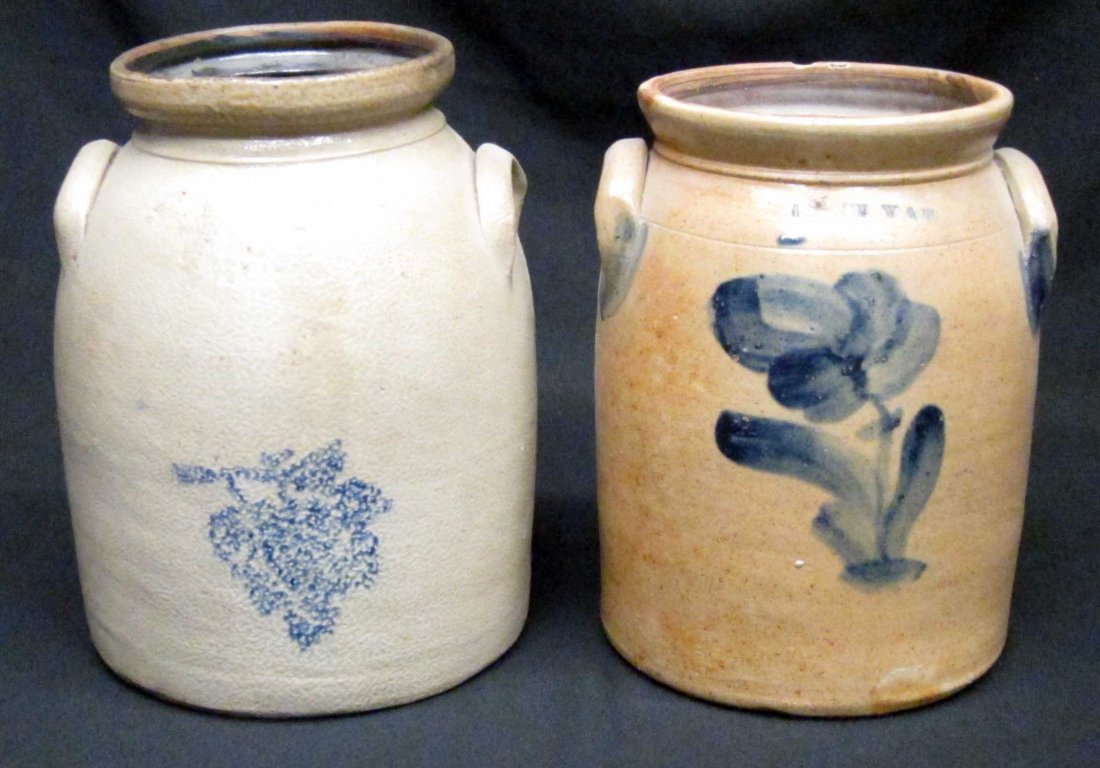 BLUE DECORATED STONEWARE CROCKS (2): (1) F. T. Wright & Son with small leaf stencil; (1) illegible with floral paint, small lip chip; H-10" - 10 1/2", G-VG
