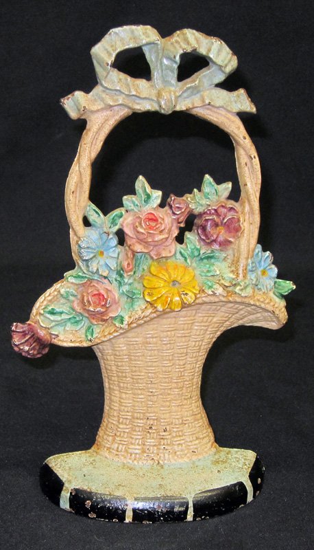 TALL BASKET OF FLOWERS DOORSTOP: Hubley, painted cast iron; minor chips; H-11", VG-EX